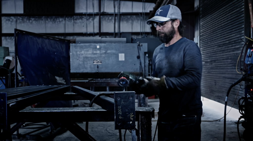 Senior welder in steel shop